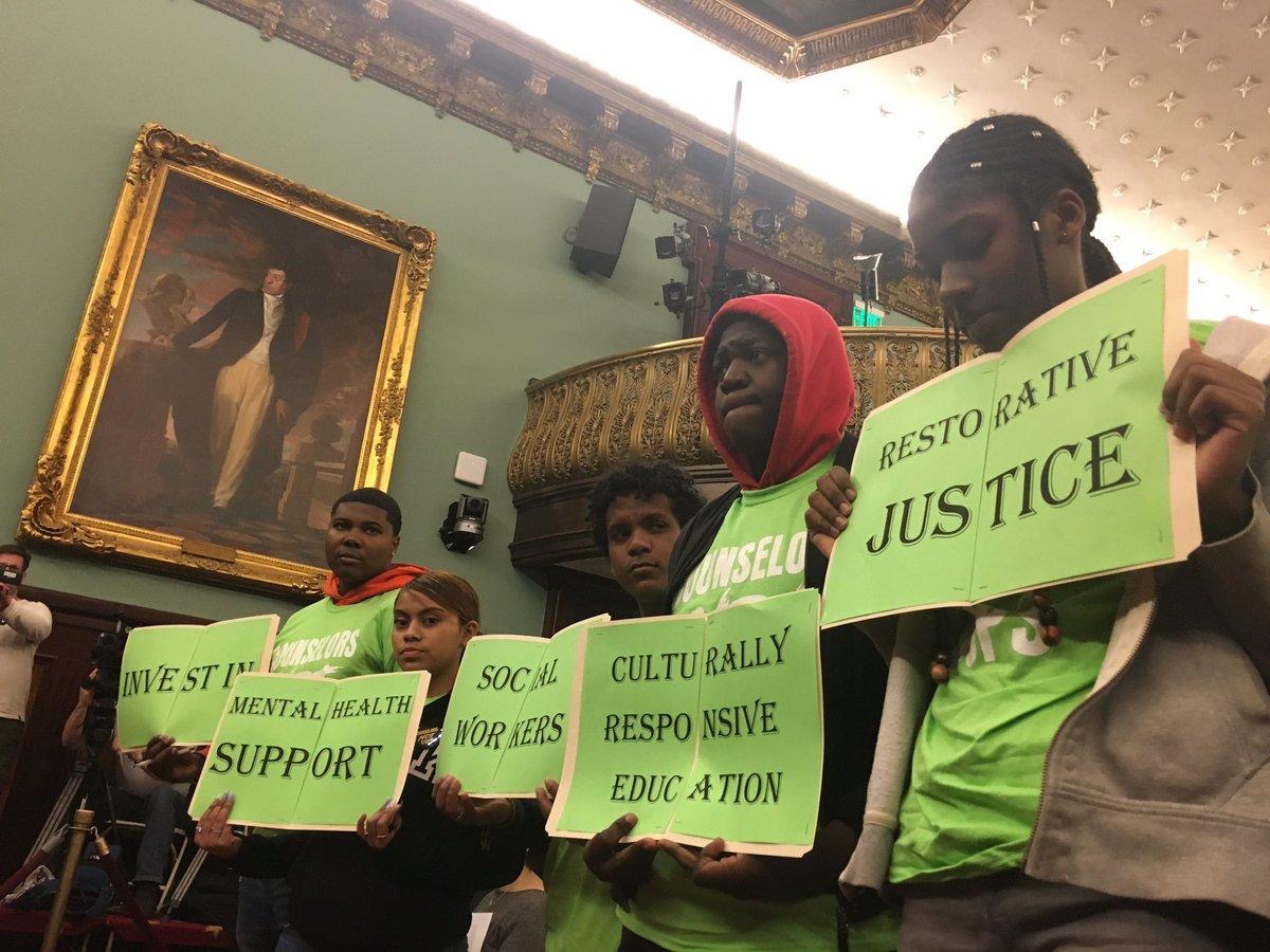 Students from the Urban Youth Collaborative demonstrate at a budget hearing in City Hall. Photo courtesy of Charlotte Pope